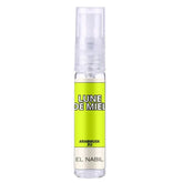 Spray bottle van Lune de Miel parfum door El Nabil met neon geel-groene vloeistof